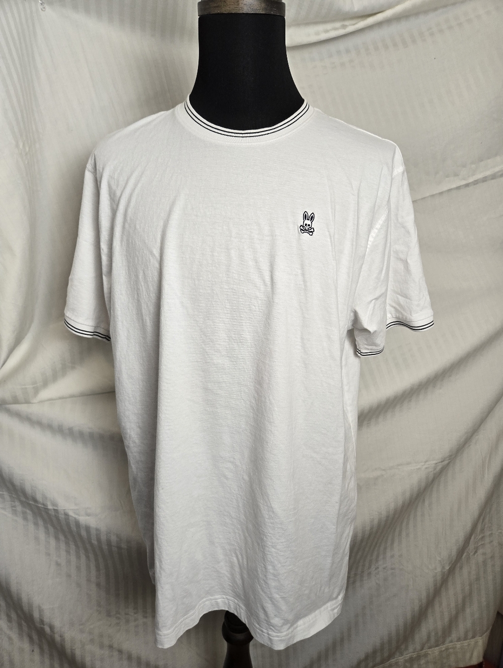 Psycho Bunny White Short Sleeve Ringer T‑Shirt with Black Trim.  TM